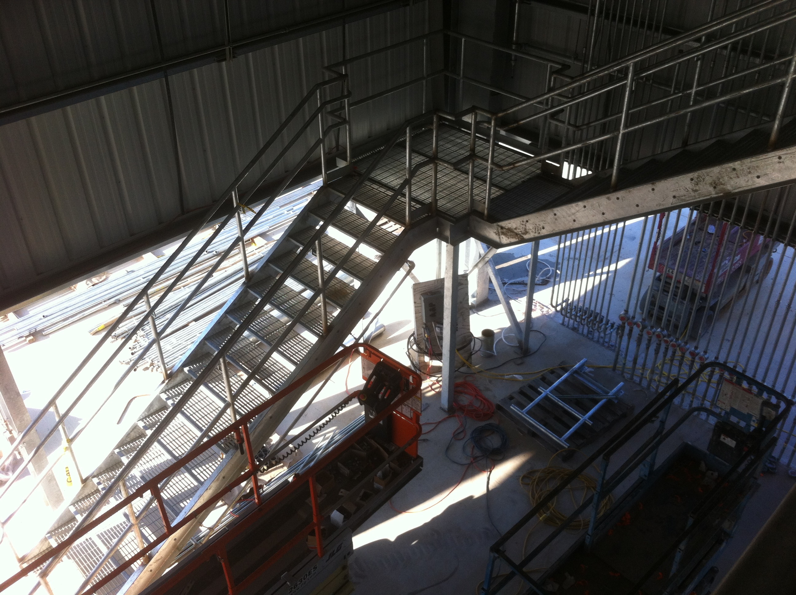 Halliburton mezzanine stairs overhead view during construction