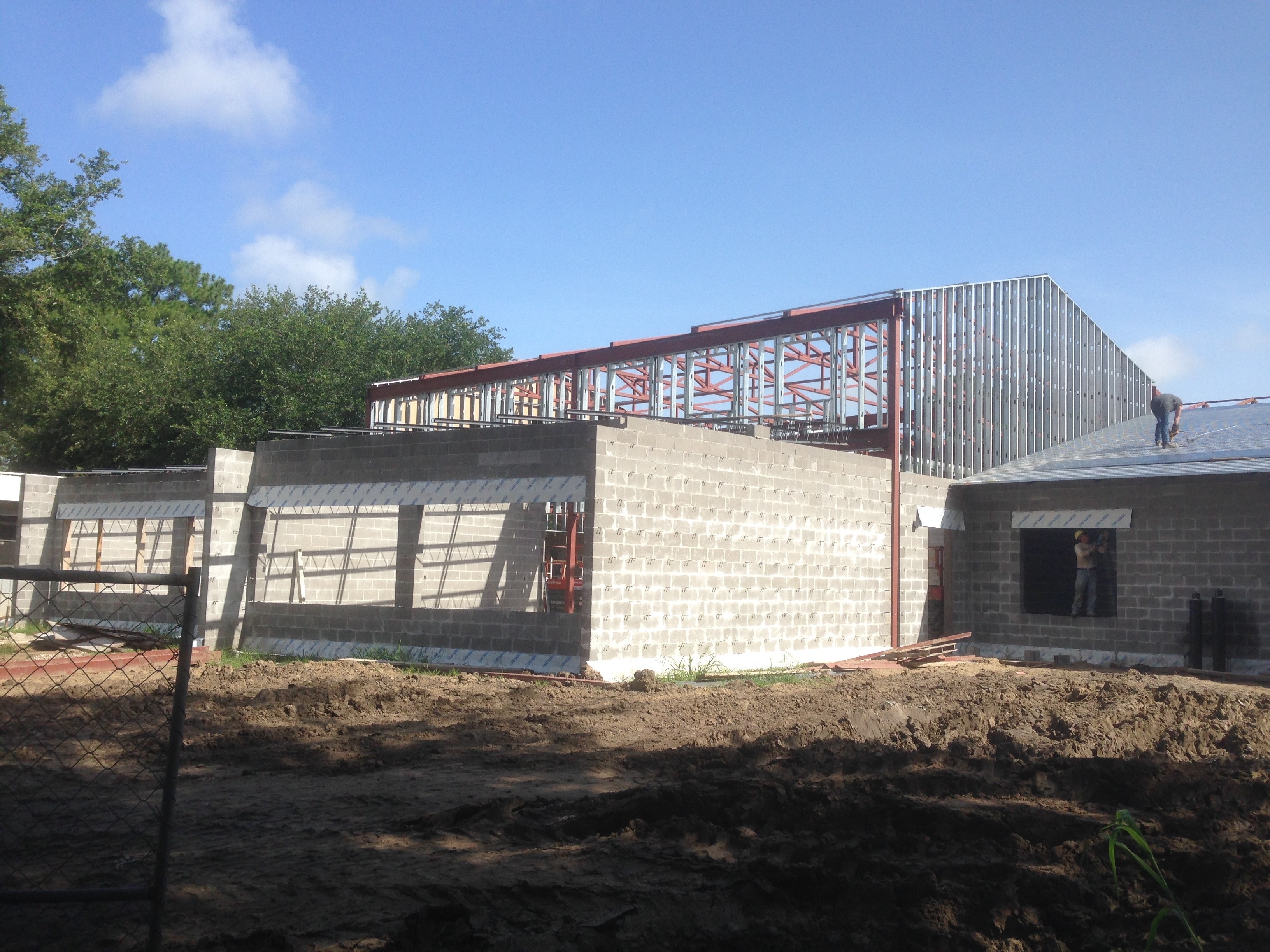 Norco Elementary Addition — steel frame and parapet supports with decking installation underway
