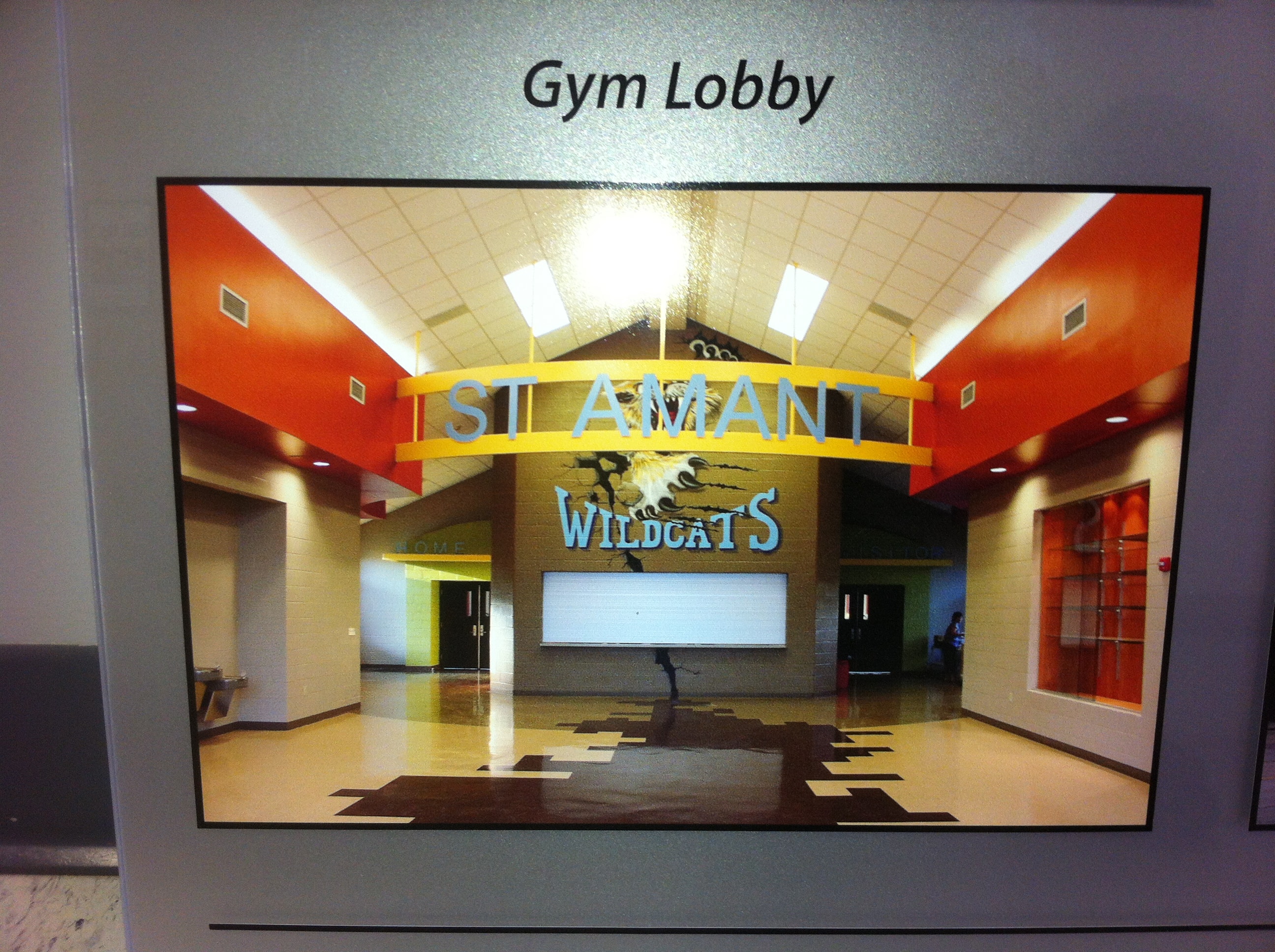St. Amant High School gymnasium atrium interior with steel beam framing